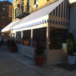 A winter vestibule enclosure for Positano's by NYC Signs & Awnings