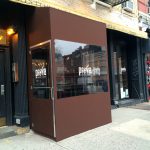 A winter vestibule enclosure for Prova by NYC Signs & Awnings