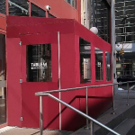 A winter vestibule enclosure for Tableau by NYC Signs & Awnings